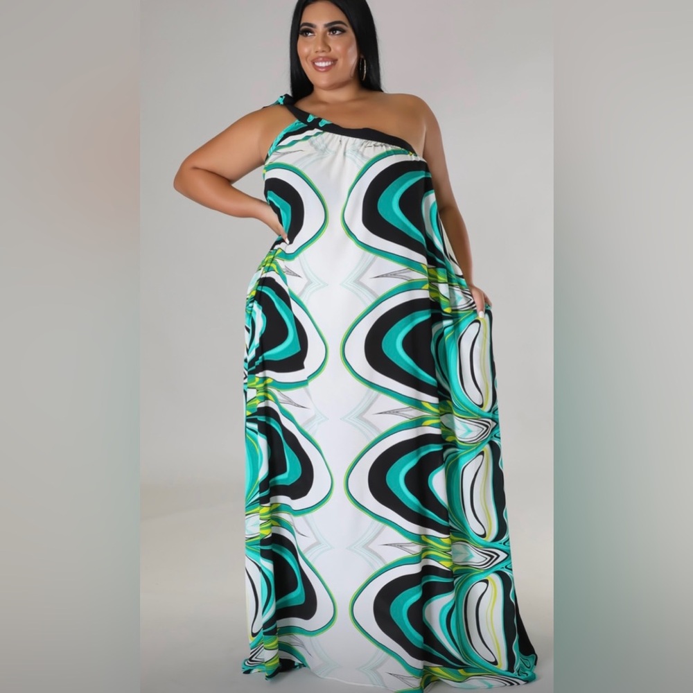 Plus size one shoulder long vacation dress.